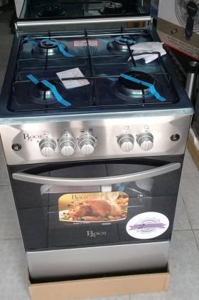 CUISINIERE 4 FEUX INOX