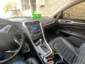 Ford Fusion 2014 Ford fusion année 2014 automatique essence intérieur cuir grand écran toit ouvrant full options 71mil km 