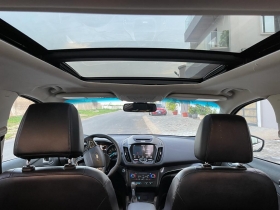 Ford Escape Titanium 2017 Marque : Ford 
Modèle : Escape Titanium (version 4*4)
Année : 2017
Carburant: essence
 Boite vitesse : Automatique
 Kilométrage : 51000 milles
Details : 
Venant 4 cylindres
full option 
interieur cuir noir blanc
 grand écran tactile caméra de recul